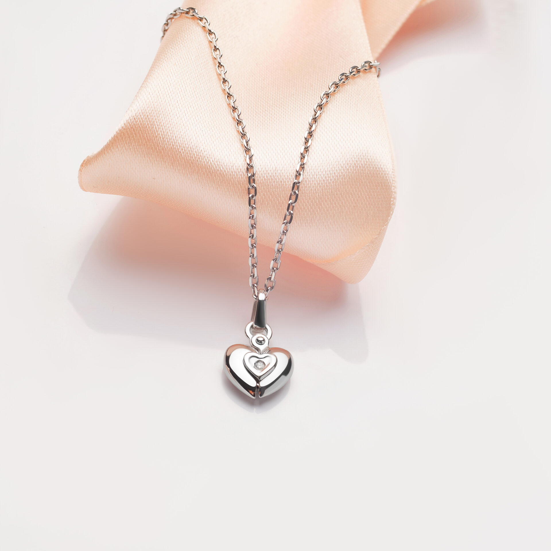 heart-necklace-with-heart-it-is-white-background